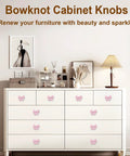 White dresser with Pink Bow Cabinet Knobs Set 12 Pieces Zinc Alloy Single Hole Drawer Knobs for nursery girls room vanity bedroom.