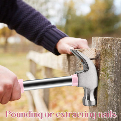 Lightweight 8oz hammer set with a small claw hammer and 25 mm rubber mallet in pink used on wooden fence