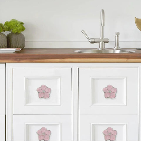 Petal Flower Drawer Pulls set on kitchen cabinet drawers with pink rhinestone inlays, zinc alloy single hole handles in silver finish