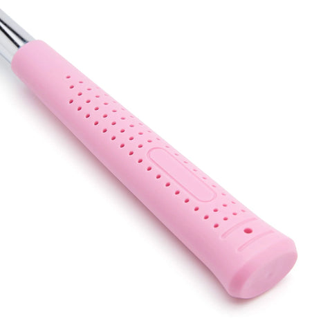 Close-up of a pink non-slip handle from an 8 oz claw hammer with a shock-absorbing grip for comfortable, accurate nail driving.