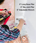 Person using 6-inch pliers from Pink 263-Piece Home Repair Tool Kit With Wide Mouth Storage Bag For DIY Projects And Breast Cancer Awareness Ribbon