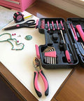 39 Piece General Household Tool Set In A Sturdy Toolbox Case For Everyday Home Repairs, DIY Projects, And Crafts with pink accents.