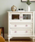 White dresser with Petal Flower Drawer Pulls Set 4pcs Zinc Alloy Single Hole Handles With Rhinestone Inlays For Dresser Closet And Cabinet.