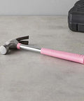 8 oz claw hammer with a shock-absorbing non-slip pink grip for comfortable, accurate nail driving and efficient nail removal; durable steel head