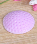 Pink silicone wall protector for door handles, part of the 5 Piece Silicone Self Adhesive Wall Protectors For Door Handles And Doorknobs Pink Cushioning Bumpers Buffer Guards And Silencers To Prevent Scratches Noise And Crashes In Home And Office set, shown on a wooden surface