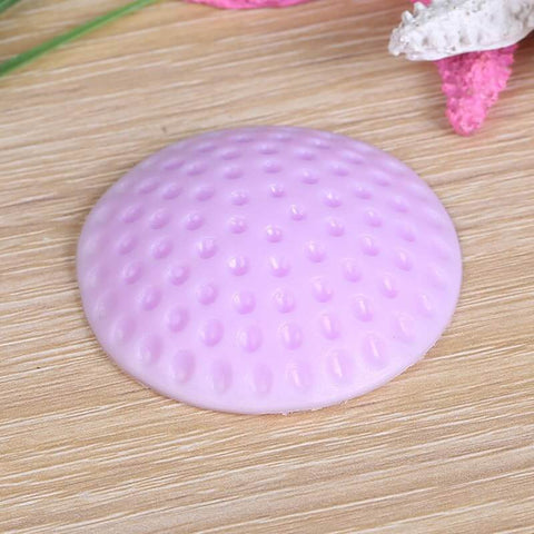 Pink silicone wall protector for door handles, part of the 5 Piece Silicone Self Adhesive Wall Protectors For Door Handles And Doorknobs Pink Cushioning Bumpers Buffer Guards And Silencers To Prevent Scratches Noise And Crashes In Home And Office set, shown on a wooden surface