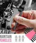 Using an Allen wrench from the Pink 25 Piece Women DIY Tool Kit Set in Compact Mini Toolbox for Beginners Home Repairs on a bike