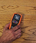 Pinless Moisture Meter for Non-Destructive Moisture Detection in Drywall, Wood, and Masonry; Detects up to 3/4-Inch Below Surface in use on wooden floor.