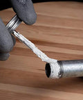 Application of Pro Grade Pipe Joint Compound With PTFE And Brush For Sealing And Lubricating Threaded Joints White Non Hardening