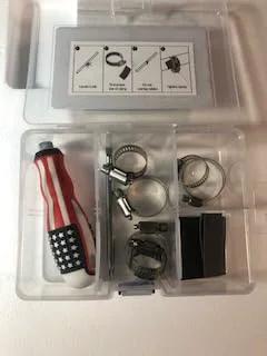 Open toolbox with screwdriver, six stainless steel clamps, and patches for Pipe Leak Repair Kit With 6 Patches And Stainless Steel Clamps, No Water Shut Off Needed, Quick Fix For Pin Hole Leaks And Small Splits In Most Household Pipes, Flexible Rubber Patches For DIY Home Plumbing.
