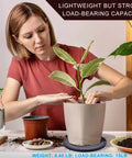 Woman using 8 Inch Lazy Susan Turntable Organizer for plants, demonstrating heavy duty swivel stand with steel ball bearings and non slip pads.
