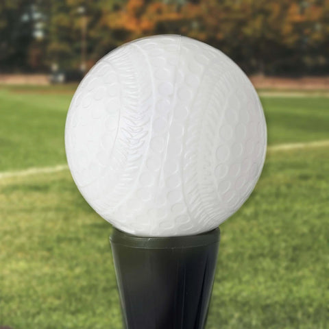 MLB Plastic Baseballs - 8 Pack shown on a stand in a grassy field, highlighting perforated design for safe training.