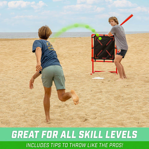 Two boys playing with Plastic Baseballs - 6 Pack on a beach, using a practice net and bat for outdoor fun.
