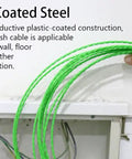 Hand holding Plastic Coated Steel Fish Tape Wire Puller for wall installations, 32 ft, green plastic-coated steel for wiring