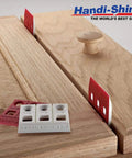 Heavy Duty Reusable Plastic Construction Shims Set Of 100 For Spacing Leveling And Plumbing Projects in use on a cabinet