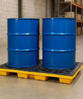 Spill Containment Platform For Industrial Use Plastic Containment Tray With Grating And Drain Outlet Heavy Duty Pallet Stackable 4400 Lbs Capacity 48 By 24 By 4 Inches Weysat with blue drums in warehouse