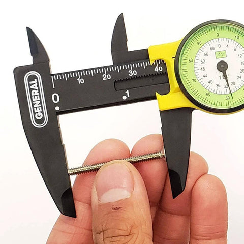 Close-up of plastic dial caliper measuring a screw, 0 to 6 inch range, fiberglass body for precise measurements, ideal for workshops.