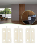Image showing 10 Pcs Plastic Door Floor Guides for Wooden Sliding Doors Bottom Guide Milky White 44x26x17mm installed in room.