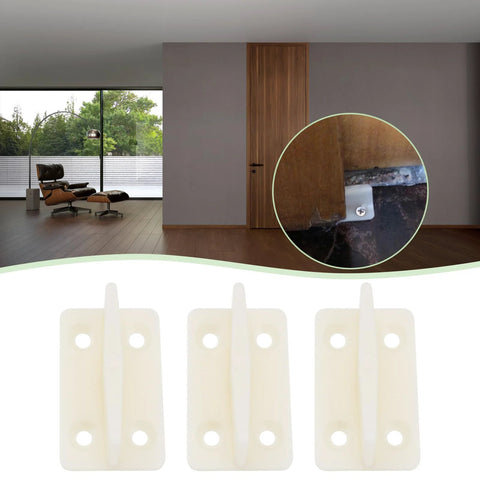 Image showing 10 Pcs Plastic Door Floor Guides for Wooden Sliding Doors Bottom Guide Milky White 44x26x17mm installed in room.