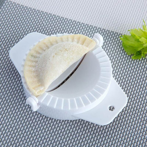 No Fuss Dumpling Maker Press Kit 3Pcs Small Nonstick Plastic Dumpling Mold with dough on grid background
