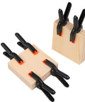 12 Pack 3.5 Inch Plastic Spring Clamps Heavy Duty Nylon Craft Clips For Backdrop Stands Woodworking And Photography Studios in use on wood.