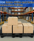 8 Pack Raised Plastic Pallets With Breathable Grid For Basement Storage Kitchen And Supermarket Use Interlocking Nestable Lightweight Moisture Resistant Floor Pallets 19.6 X 11.8 X 4.9 Inch Black, boxes stacked on pallets.