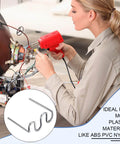Person using hot staples welding wire kit for plastic repairs with 0.8 mm wave shape, tungsten steel, on electronic equipment
