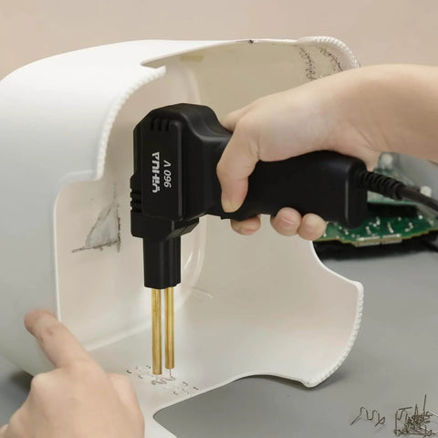 Person using Portable Plastic Welding Kit With LED Light, 200 Hot Staples, Hot Stapler And Assistive Cutter For Plastic Crack Repair on white plastic.
