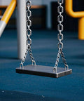 Swing set with 304 stainless steel link proof coil chain, showcasing durability in light duty applications for clothes hanging and theft prevention.