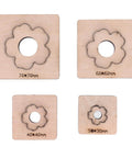 Plum Blossom Shaped Leather Die Cutter 4 Piece Set For Handmade DIY Leather Craft in various sizes with wooden bases.
