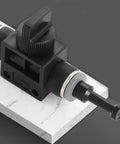 Close-up of a pneumatic plug from a 30 Pack Pneumatic Cap Style Plug Fittings Set With Push To Connect Air Line Plugs on marble surface.