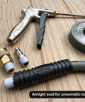 ThreadPro High Density PTFE Thread Seal Tape used with pneumatic tool fittings on a wooden surface