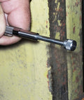 Hand using Pocket Model Grease Joint Rejuvenator Tool By IPA Tools Innovative Products Of America on machinery