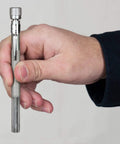 Hand holding Pocket Model Grease Joint Rejuvenator Tool By IPA Tools Innovative Products Of America for lubrication tasks