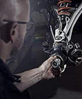 Mechanic using 40mm Wheel Bearing Greaser Kit For Polaris ATVs UTVs And SxS Must Have Quick Grease Packer Without Removing Axle