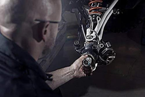 Mechanic using 40mm Wheel Bearing Greaser Kit For Polaris ATVs UTVs And SxS Must Have Quick Grease Packer Without Removing Axle