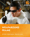 Man wearing Polarized Safety Glasses With Smoke Lenses Gunmetal Frame Unisex Case Included, shown in a work environment.