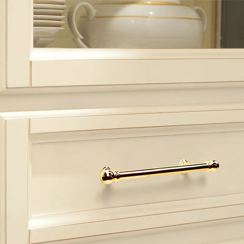 10 Pack Polished Brass Cabinet Pulls 5 Inch Hole Center 128mm Solid Zinc Alloy Handles installed on white kitchen drawer