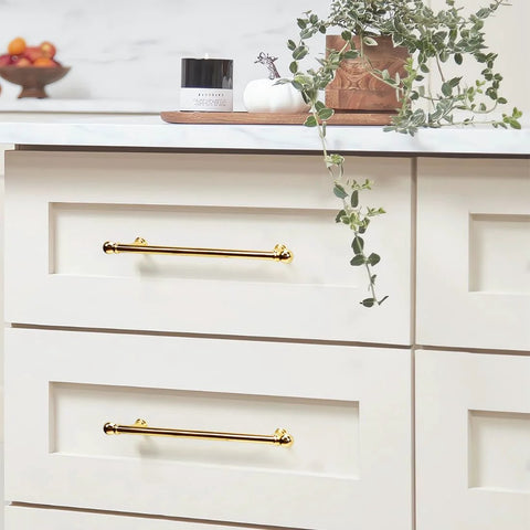 10 Pack Polished Brass Cabinet Pulls 7.5 Inch Hole Center Solid Zinc Alloy Drawer Handles installed on light wood drawers