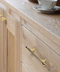 Installed 10 Pack Polished Brass Kitchen Drawer Pulls 3-3/4 Inch Center To Center Solid Zinc Alloy Cabinet Handles on wooden cabinet