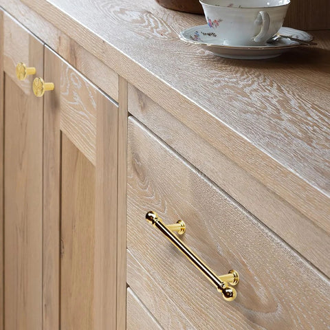 Installed 10 Pack Polished Brass Kitchen Drawer Pulls 3-3/4 Inch Center To Center Solid Zinc Alloy Cabinet Handles on wooden cabinet