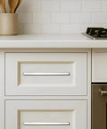 Kitchen cabinet with polished nickel square drawer handle, part of 10 Pack Five Inch Center To Center Polished Nickel Square Cabinet Pulls.