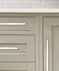 Front view of 10 Pack Five Inch Center To Center Polished Nickel Square Cabinet Pulls on wooden kitchen cabinets and drawers.