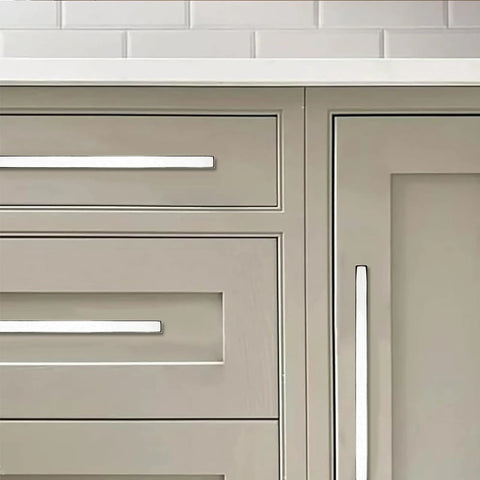 Front view of 10 Pack Five Inch Center To Center Polished Nickel Square Cabinet Pulls on wooden kitchen cabinets and drawers.