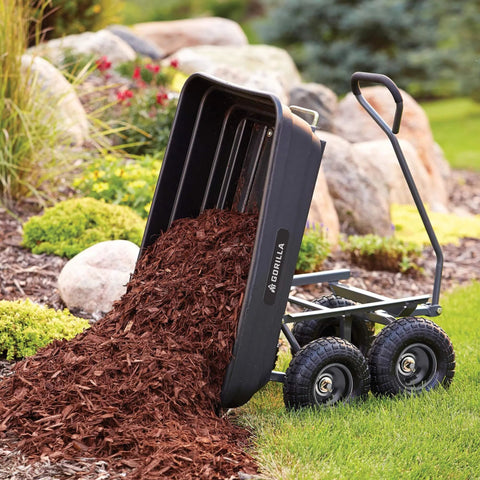 Poly Garden Dump Cart with 4 Cu Ft Tub 600 LB Haul Capacity Utility Wagon with dumping mulch in garden