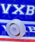 Acetal/POM Plastic Bearing 623 - Glass Balls - 3x10x4mm close-up with VXB packaging backdrop