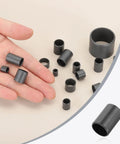 Hand holding black Six Pcs POM Sleeve Bearing Plastic Bushings Self Lubricating Oilless Maintenance Free, 12x14x20 mm, small devices use