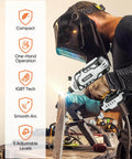 Person using Portable 110V Arc Welder With IGBT Inverter 5 Current Settings for DIY metalwork on a table. Safety helmet worn.
