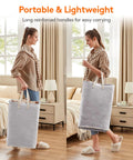 Person carrying Two Pack Large Collapsible Laundry Hampers 80L Each Freestanding Waterproof Interior Foldable Laundry Baskets With Easy Carry Handles For Laundry Room Bedroom Bathroom College Dorm Grey 2x80L