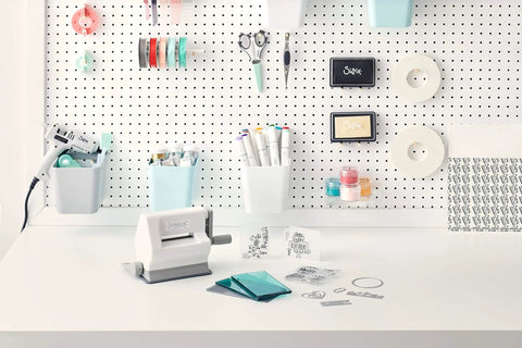 Portable Die Cutting And Embossing Starter Kit For Arts And Crafts Scrapbooking And Cardmaking On The Go Sizzix Sidekick 661770 on desk